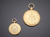 two gold lockes, one with a medallion and the other with a medallion