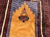 an image of a rug with a hanging basket on top of it