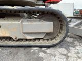 an image of a close up view of a tractor track