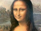 a painting of a woman with long hair in a brown dress