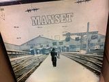 an image of a picture of a man riding a motorcycle on a train track