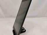 a tablet that is sitting on a stand on a table