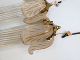 three lamps that are hanging from the ceiling