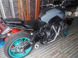 a motorcycle that is parked in a garage