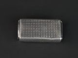 a close up of a silver cigarette case on a black surface