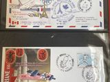 two envelopes with airmail stamps on them sitting on a table