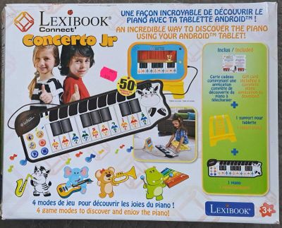 une photo d'un clavier électronique pour enfants dans son emballage