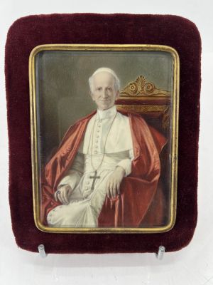 an old picture of a man in a red robe sitting in a chair