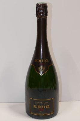 an image of a bottle of champagne on a table
