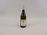 a bottle of wine that is sitting on a table