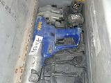 a box with tools inside of it on the floor