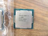 an intel core i5 - 9400 processor with its box open