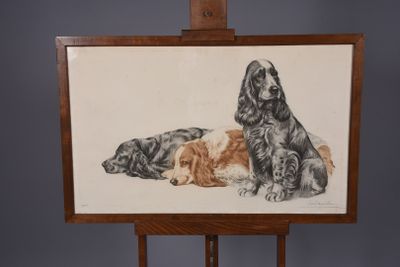a painting of two dogs and a cat on a easel
