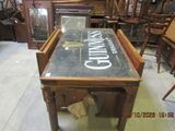 a table that has a sign on it in a store