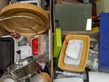 a cardboard box filled with assorted items on the floor