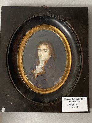 portrait of a man in a blue coat and white shirt in a black frame