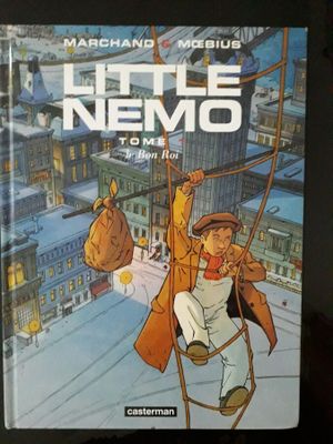 la couverture d'une bande dessinée sur laquelle figure l'image d'un homme suspendu à une corde