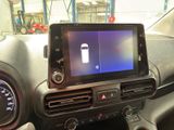 a picture of a car dashboard with a cell phone in it