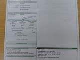 une image montrant un gros plan d'un document posé sur une table