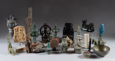 a lot of different pieces of art on the table