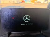 the mercedes logo is displayed on the dashboard of a car