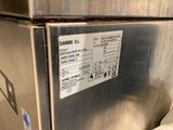 a close up of a stainless steel refrigerator with a label on it