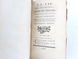 an open book with a picture of flowers on it