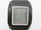 a digital watch that is displayed on a white surface