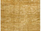 un tapis beige avec une surface en bois