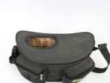 a black bag with a wicker inside of it