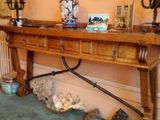 a wooden table with a clock on top of it