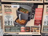 a box of ninja double stackers with a chicken in it