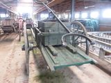 an old machine that is sitting in a barn