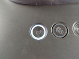 a close up of a toaster with buttons on it