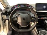 the interior of a car with a steering wheel, dashboard, and dash board