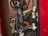 a red box with a bunch of tools inside of it