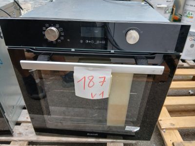 a black oven that has a price tag on it