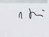 a close up of a piece of paper with writing on it