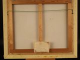 an image of a small easel with a piece of paper on it
