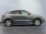 the audi qx is parked in a garage with a gray background