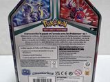 a close up of a box of pokemon cards on a table