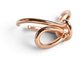 an image of a close up of a ring on a white surface