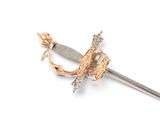 a silver and gold sword on a white background