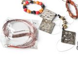 a variety of jewelry that includes a necklace, bracelet, and other items