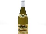 an image of a bottle of wine sitting on top of a white table