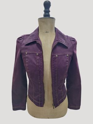a woman ' s jacket on a mannequin mannequin mannequin mannequin mannequin mannequin mannequin mannequin mann