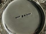 a silver plate that has a message on it