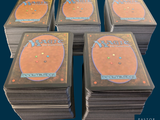 several cards are stacked on top of each other on a blue background