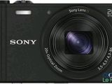 a close up of a camera on a white background with a lens
