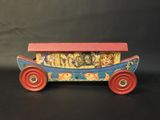 an image of a small toy boat with people in it